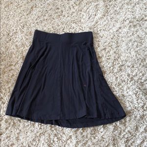 Knee length navy blue skirt